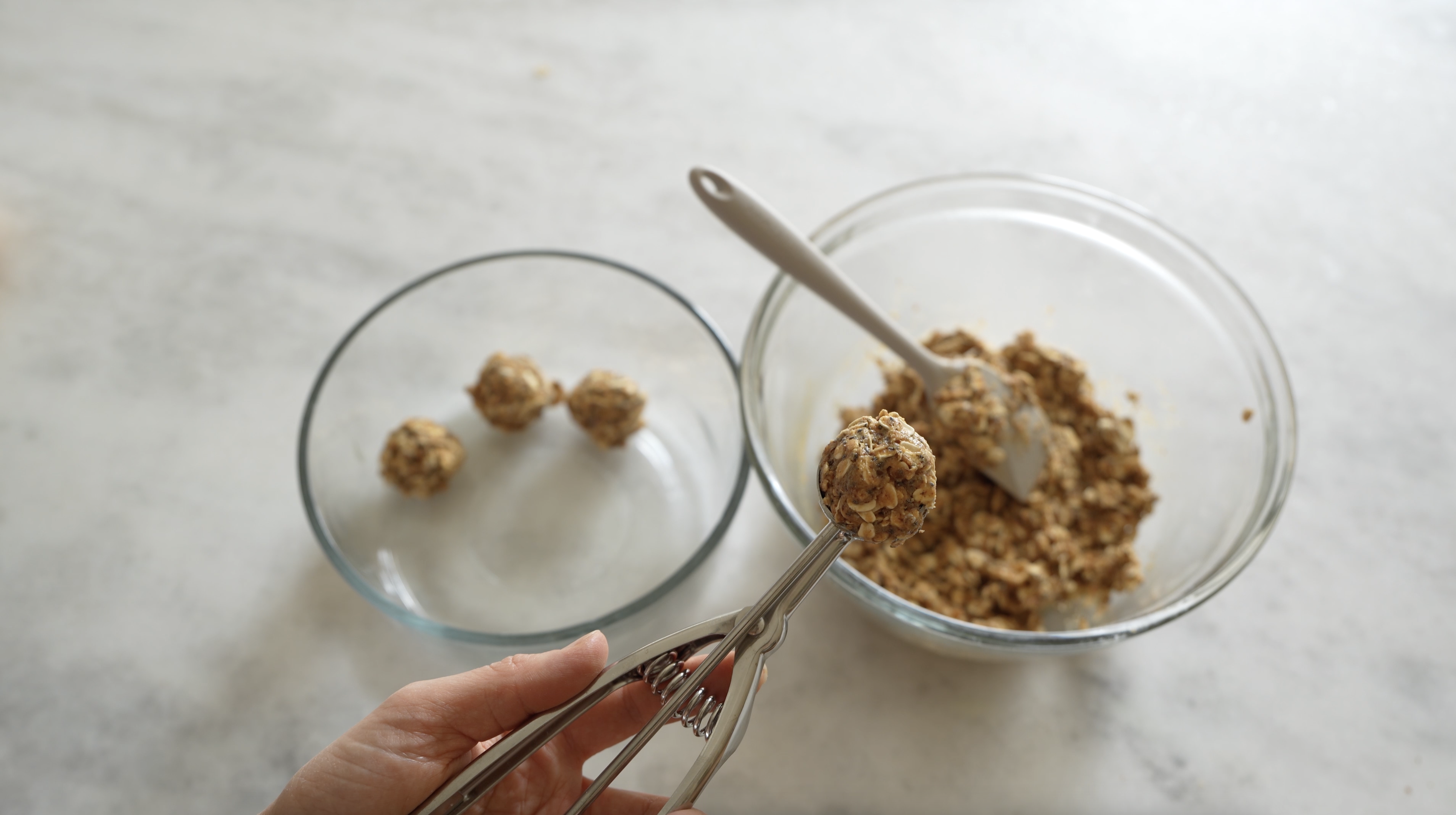 scoop of peanut butter energy bites on the counter