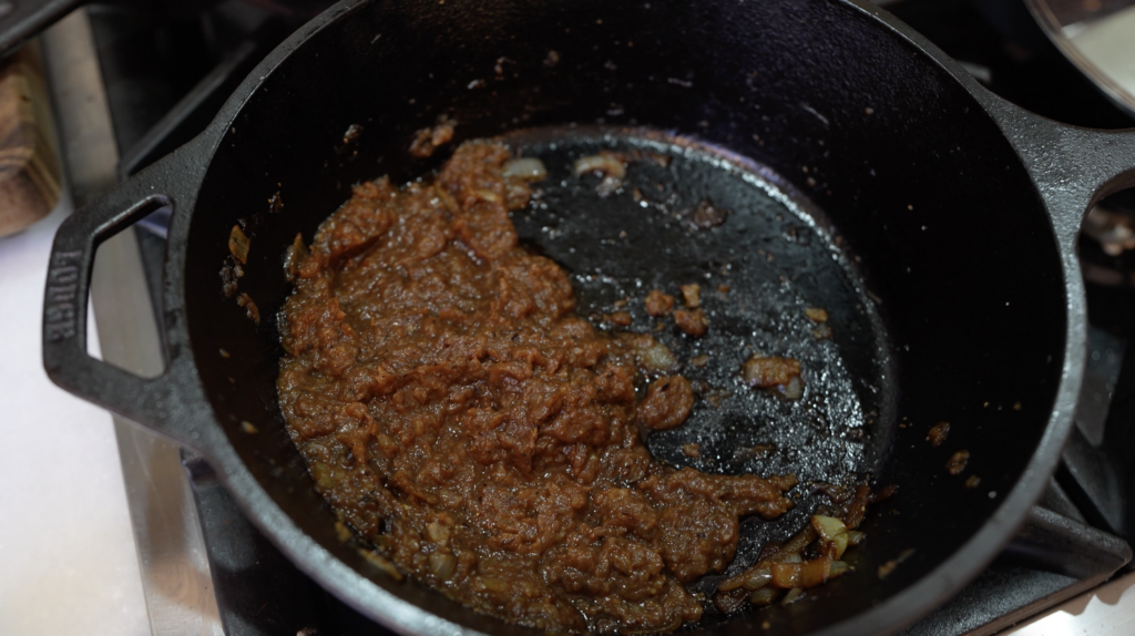 pureed caramelized onions in a cast iron pot