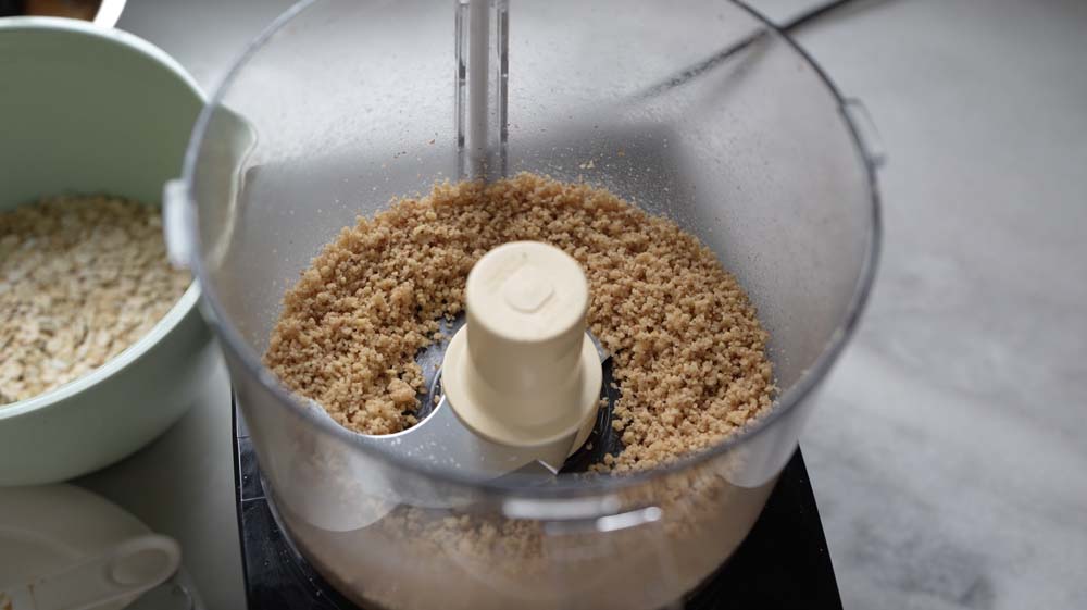 walnut crumbles in a food processor for breakfast cookies