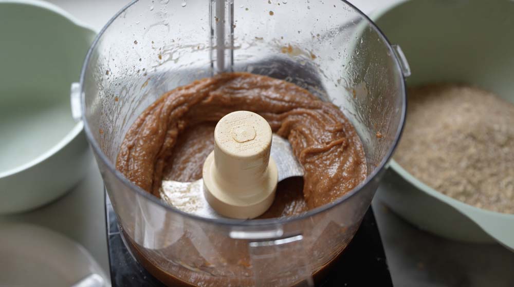 Creamy ingredients in a food processor for breakfast cookies