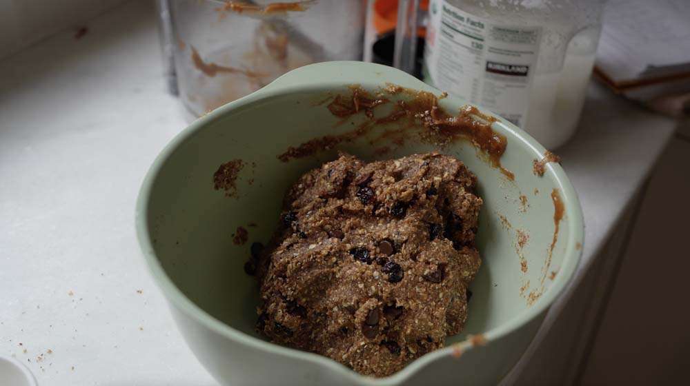 Healthy cookie dough in a mixing bowl