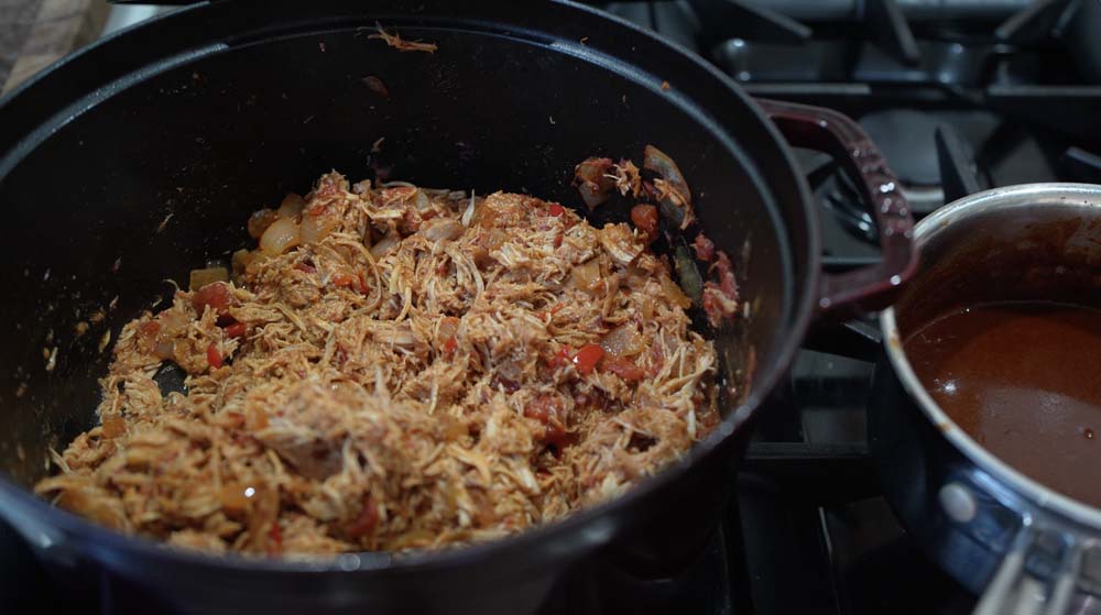shredded chicken in a stuab cocotte