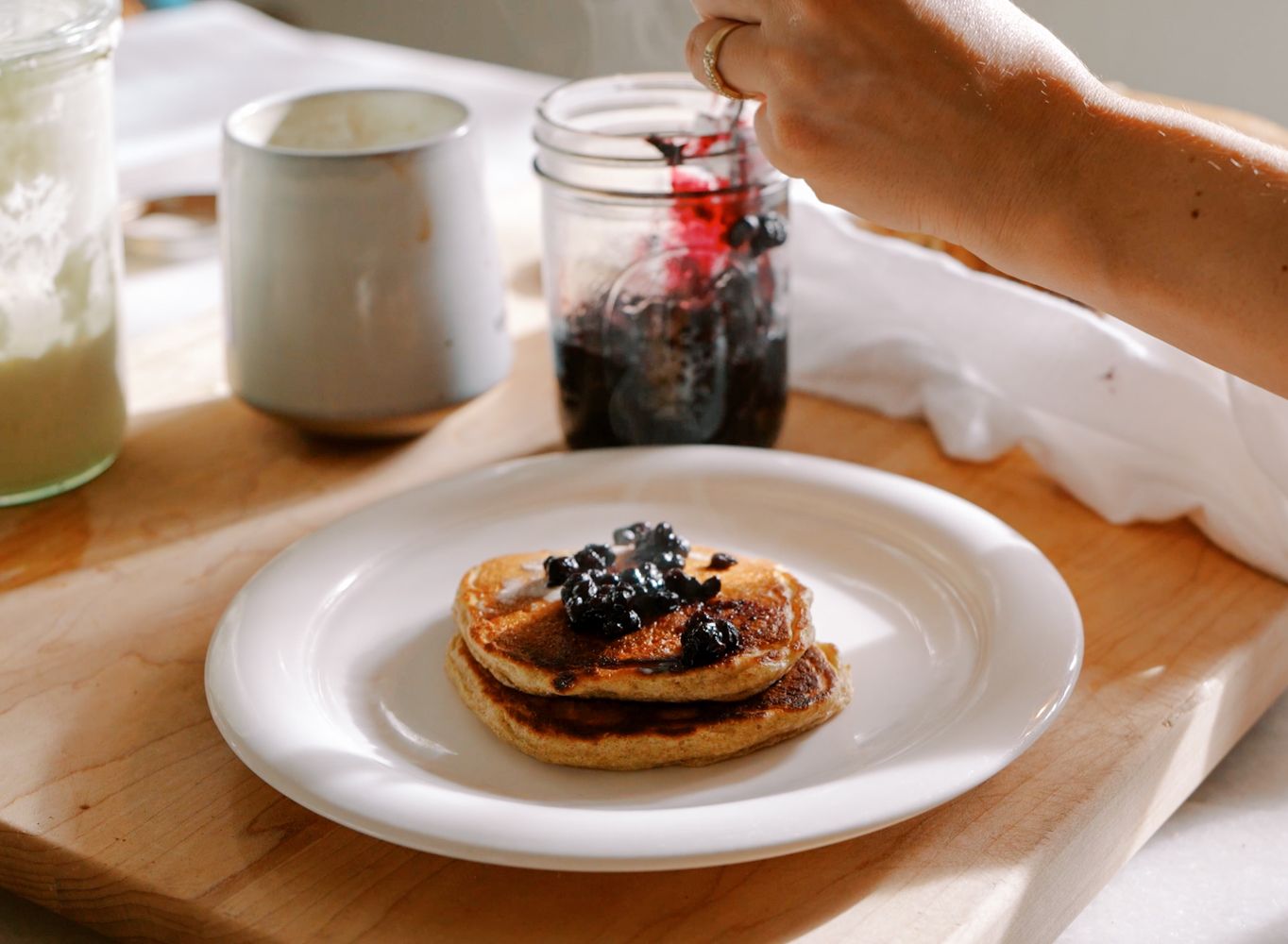 simple blueberry compote on pancakes