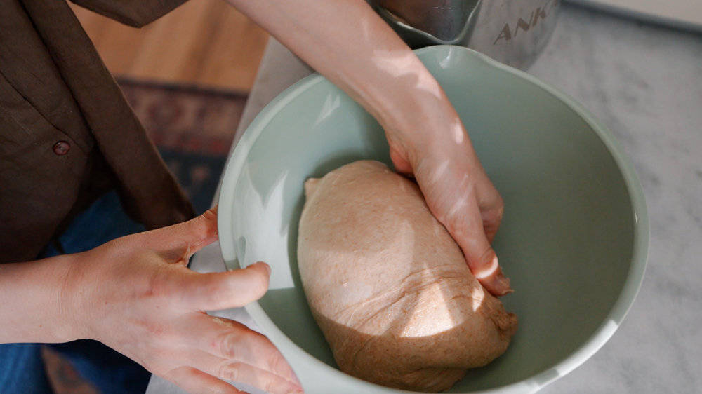 shaping soft pull-apart roll dough to rise in a bowl