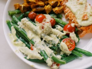 Salmon Nourish Bowls with Creamy Avocado Caesar Dressing