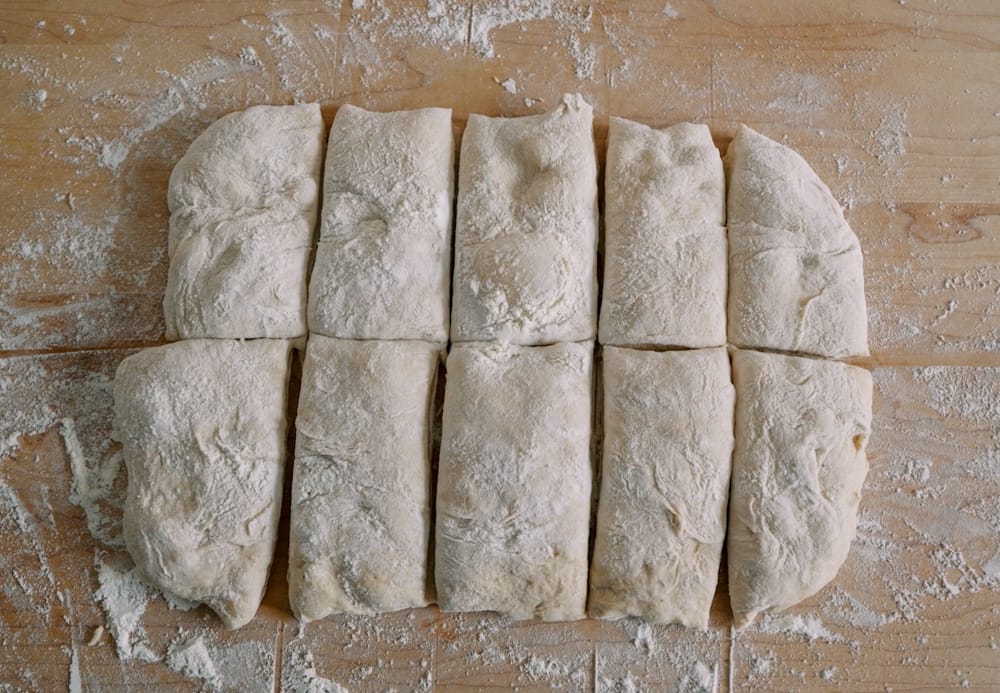 sourdough ciabatta dough rolls on cutting board