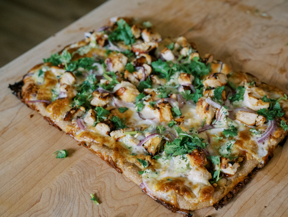 bbq chicken pizza with jalapeno ranch drizzle sourdough