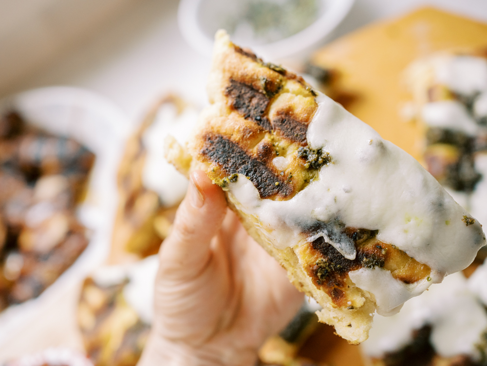 Grilled Flatbread with Pesto, Mozzarella, and Balsamic Glaze