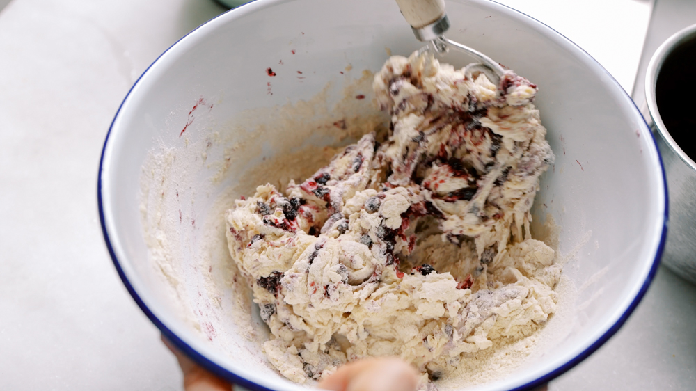 blueberry bagel dough in a mixing bowl